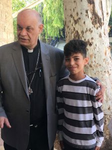 A priest and student at Holy Land Institute for the Deaf, Salt Jordan