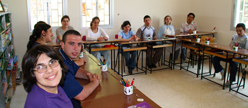 A photo of students in horshoe formation at their desks at St. Luke’s Center for Rehabilitation, Beirut, Lebanon