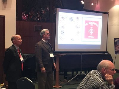 A photo of Former AFEDJ Executive Director John Lent and National Cathedral Dean Randy Hollerith at St. Alban’s Church in Washington, D.C in 2018.