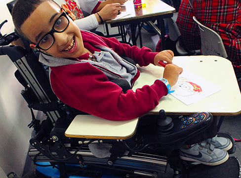 A photo of a boy in a wheelchair representing the Worship Resources section of AFEDJ.org