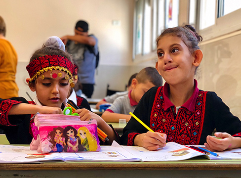 A photo of two young girls at Princess Basma School