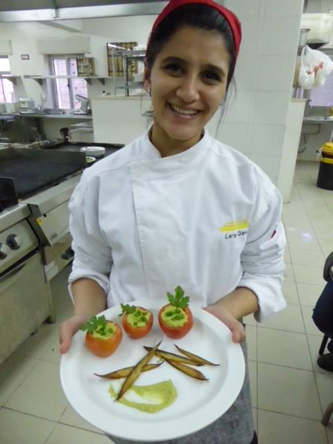 A student shares her entry in a cooking competition at ETVTC